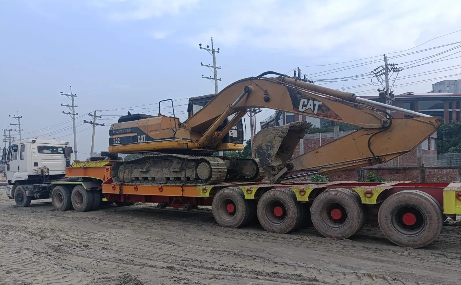 Tracked plant on low-bed