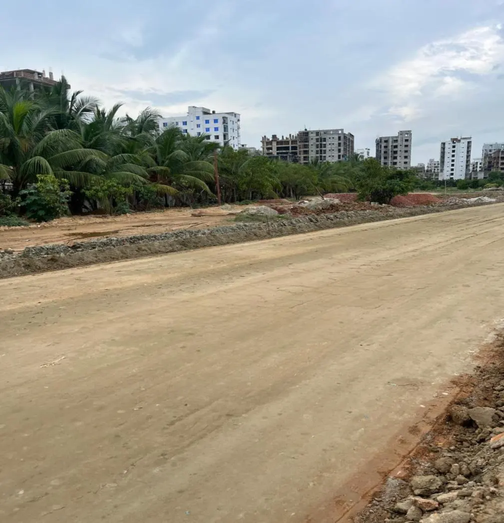 The same alignment three days later — a smooth, crowned SoilBinder-stabilized road base.