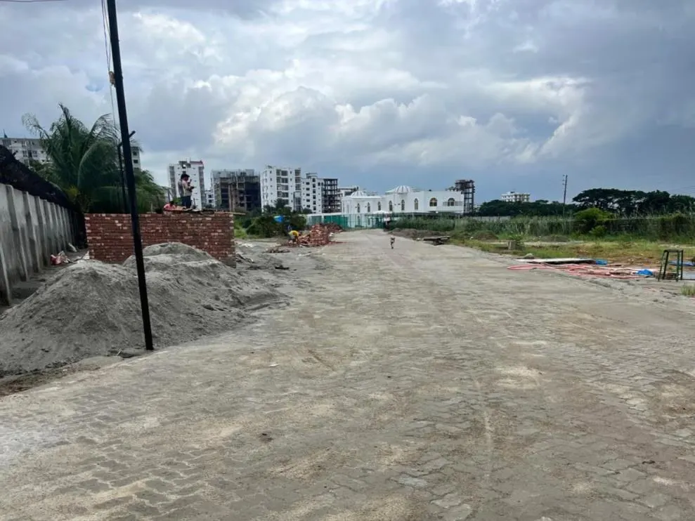 Month 3 — paver blocks laid directly on the base.