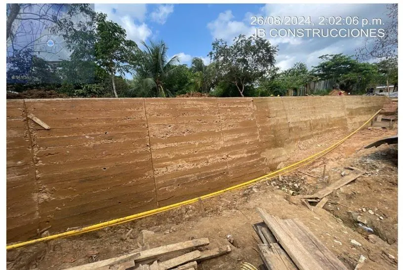 The completed gravity retaining wall after formwork removal.