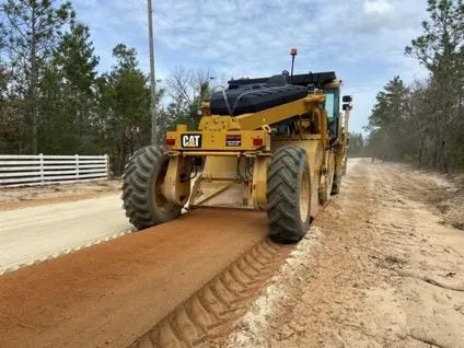Motor grader cutting final levels.